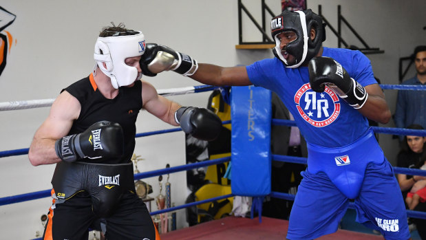 In action: Jeff Horn sparring with Ray Robinson, who defeated Terence Crawford as an amateur.
