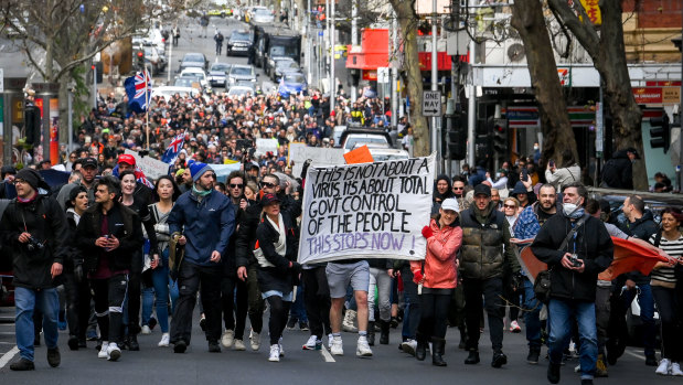Lockdown protesters march through central Melbourne on July 24.