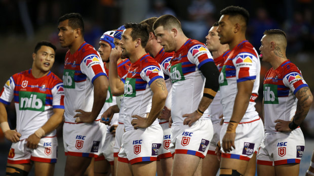 Walkover: The Knights hang their heads during their capitulation against the Tigers.
