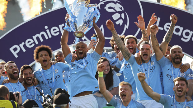 Too strong: Manchester City celebrate another title success.