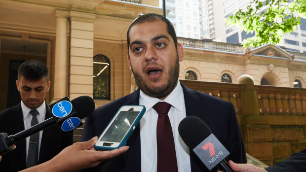 Mohamed Nizamdeen's lawyer, Moustafa Kheir, speaks to reporters outside the Sydney Central Local Court on Friday.