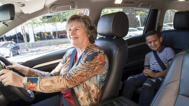Big savings: western suburbs motorist Julia Logan and son Kayden.