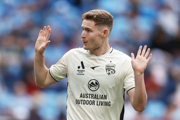 Harry Van der Saag celebrates his goal for Adelaide United.