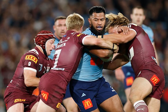 Payne Haas takes a carry for NSW.