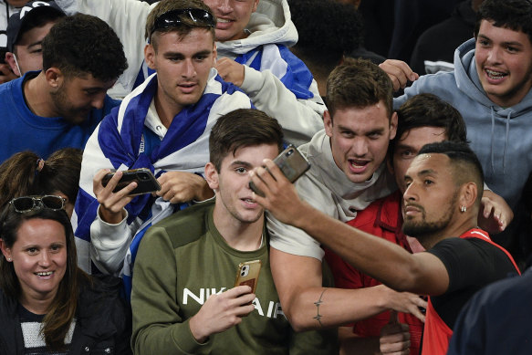 Nick Kyrgios poses for a selfie with fans after his first-round win at the Australian Open, a match rival Liam Broady discusses in the documentary Australia’s Open. 