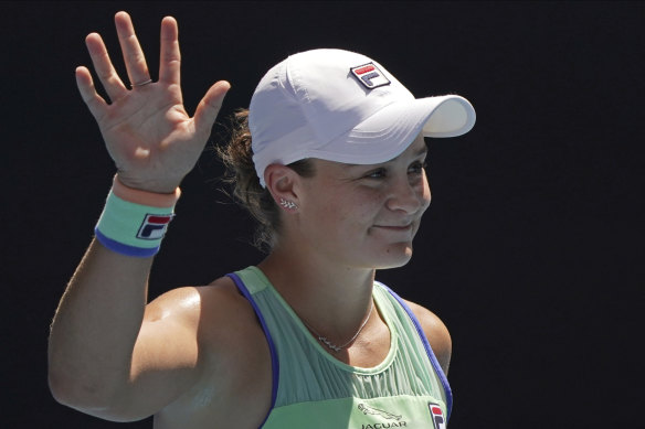 Ashleigh Barty waves to the crowd after beating Petra Kvitova in straight sets.