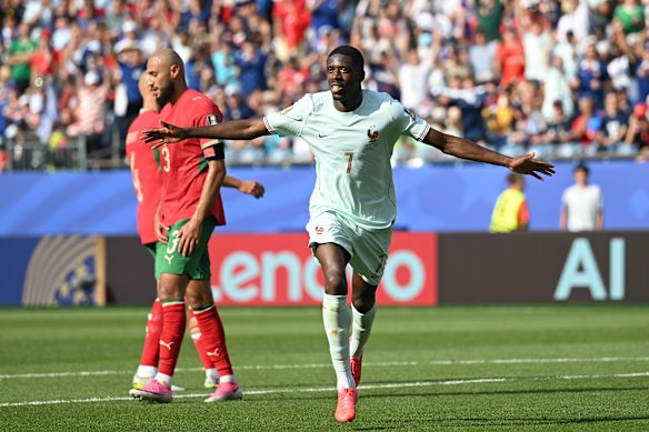 Dembele is celebrating.