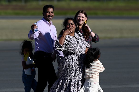The Murugappan family and Angela Fredericks arrive at the Thangool Aerodrome in June 2022.