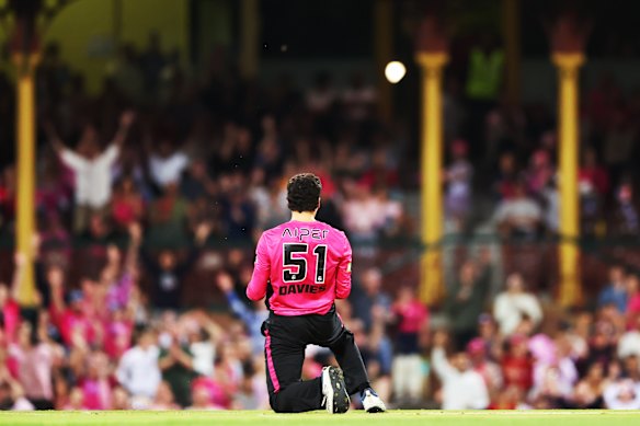 Joel Davies celebrates the wicket of Matt Wade.