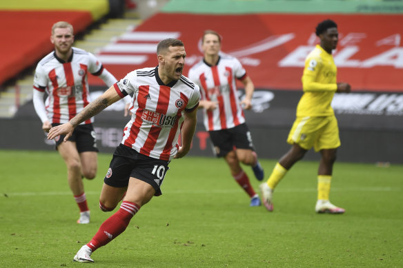 Sheffield United's Billy Sharp after scoring his side's opening goal from the penalty spot against Fulham at Bramall Lane on Sunday.