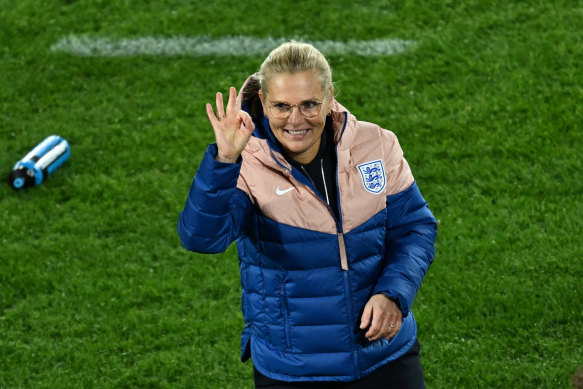 England manager Sarina Wiegman celebrates after beating Colombia.
