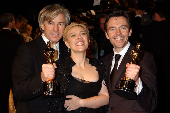 Luhrmann with wife Catherine Martin and co-writer Craig Pearce during the 2002 Vanity Fair Oscars Party. That year, Moulin Rouge! won Oscars for best art direction and best costume design.