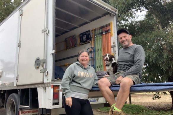 Roger Coombes and partner Emma with their dog. They use Truckit and other apps to travel the country in a truck.