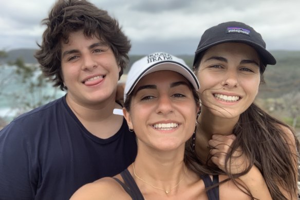 James pictured with two of his sisters. 