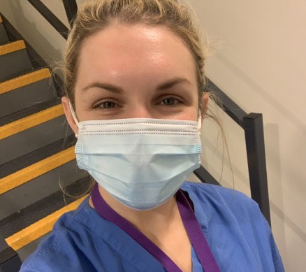 Kerri Doggett, 30, at the London hospital where she has worked for the last three years. She took this selfie just prior to being vaccinated.