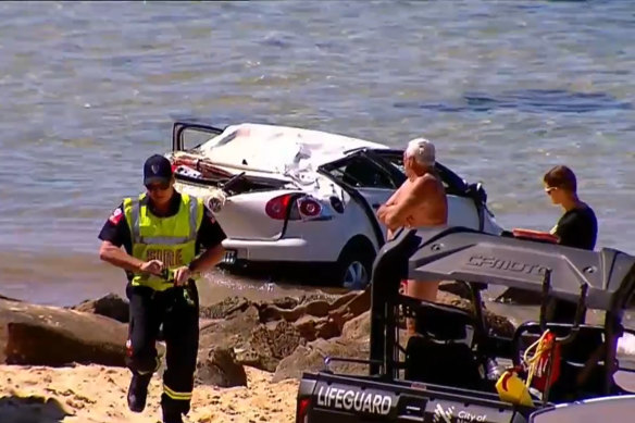 A car landed on Bar Beach in Newcastle on Thursday after driving over the edge of a cliff.
