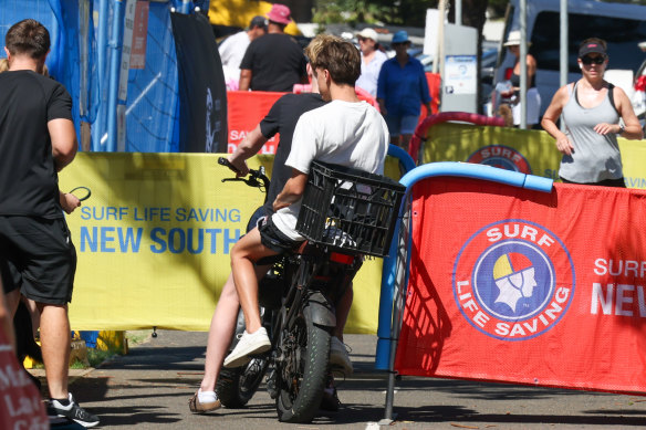 Two people spotted riding with no helmets in Manly.