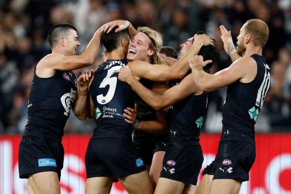 Carlton celebrate their second win to start the 2024 men’s season.