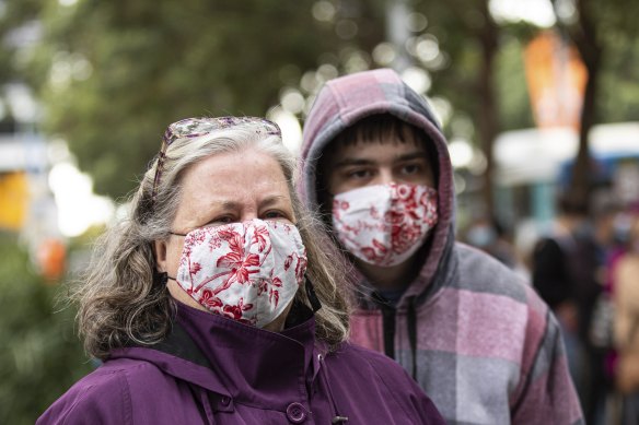 Monique Bennett and son Stefan at the NSW Health Vaccinination Centre at Homebush on Saturday.