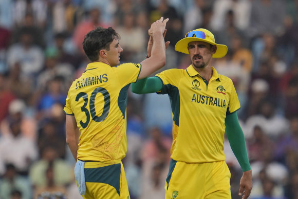Mitchell Starc claims a wicket with the second ball after the rain break