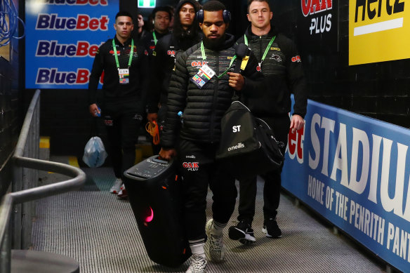 Sunia Turuva on boombox duties with his Penrith teammates.