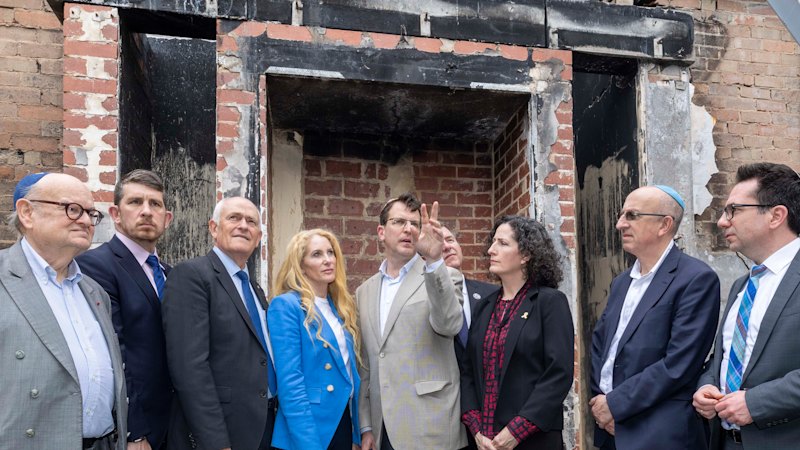 Almost a year after synagogue firebombing, Jews gather in sorrow – and fear