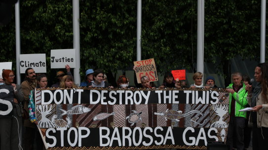 Protesters outside the Federal Court in Melbourne during a Santos appeal hearing over the Barossa gas project.
