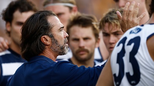 Geelong coach Chris Scott addresses his players on Easter Monday.