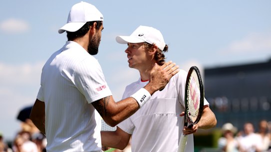 LONDON, ENGLAND - JULY 07: Matteo Berrettini of Italy interacts with Alex De Minaur of Australia following the Men’s Singles second round match during day five of The Championships Wimbledon 2023 at All England Lawn Tennis and Croquet Club on July 07, 2023 in London, England. (Photo by Clive Brunskill/Getty Images)