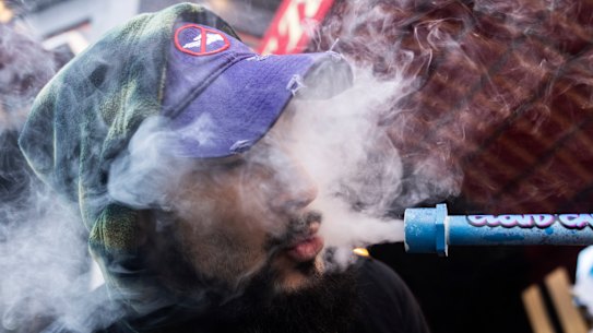 A smoker outside the Smacked pop-up cannabis dispensary in New York. 