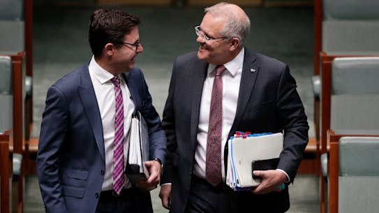 Drought Minister David Littleproud and Prime Minister Scott Morrison share a laugh despite tension between the Liberals and the Nationals over drought. 