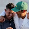 McIlroy, with caddie Harry Diamond, is overcome with emotion.