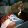 Sydney dentist suspended, patients warned of exposure to bloodborne viruses