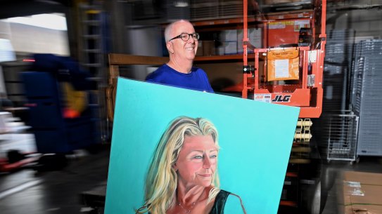 Artist John Klein delivers his portrait of actress Tina Bursill to the Art Gallery of NSW loading dock this week.