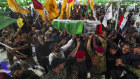 Mourners at a funeral in Karbala, Iraq for an Iranian Revolutionary Guard officer killed in an Israeli airstrike in Beirut.