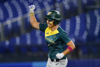 Jade Wall celebrates her home run.