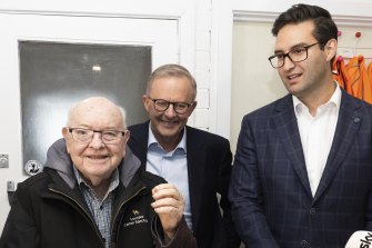 Josh Burns (right) with Father Bob Maguire and Anthony Albanese this month.