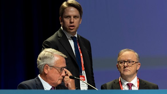 The man with tough advice: ALP national secretary Paul Erickson, standing, with Prime Minister Anthony Albanese and Labor’s national president Wayne Swan at the party’s national conference in  August. 