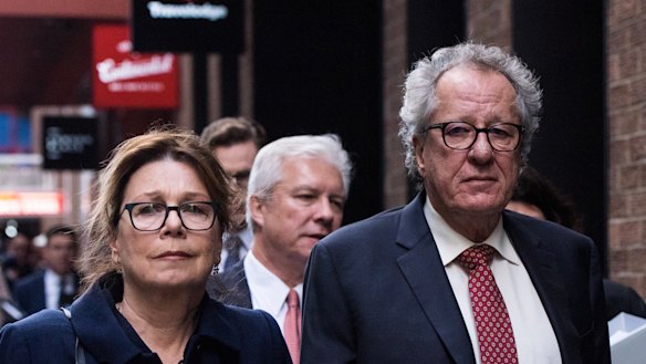 Geoffrey Rush and his wife Jane Menelaus leave the Federal Court in Sydney after his defamation win.