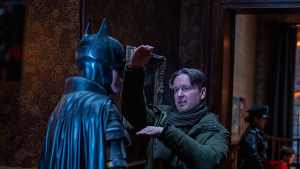 Robert Pattinson on the set of The Batman with director Matt Reeves. 