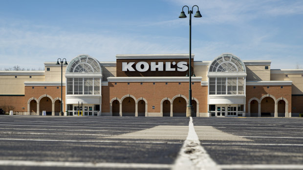 An empty parking outside a closed Kohl's store is shown in Indianapolis, Indiana.