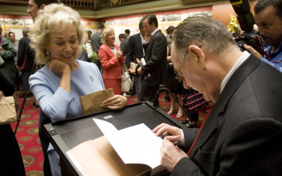 Blanche D'Alpuget gets a book signed by Graham Freudenberg in 2008. 