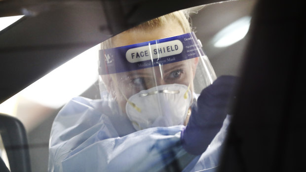 A coronavirus test at a drive-through clinic outside Bunnings in West Footscray.