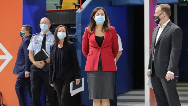 Premier Annastacia Palaszczuk, pictured at the Brisbane Entertainment Centre vaccination hub, has dispatched cabinet members on a week-long “vax-a-thon” ahead of the state’s planned reopening.