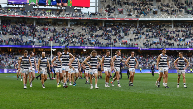 Diminshed: Geelong players leave the field after losing to Fremantle on Saturday.