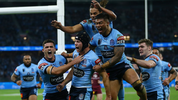 Matt Burton celebrates his try.