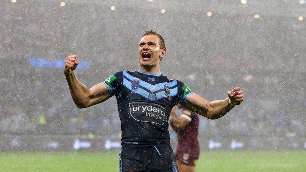 Tom Trobojevic goes wild after his third try in an epic performance for NSW.