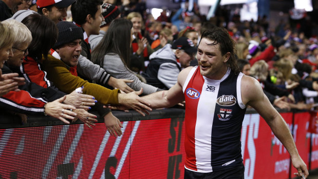 Bouncing back: Jack Steven celebrates with Saints fans at Marvel Stadium after a heart-stopping win over the Dockers.