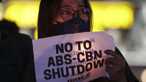 Another battle for press freedom: protester holds a banner during a rally in metropolitan Manila, Philippines.