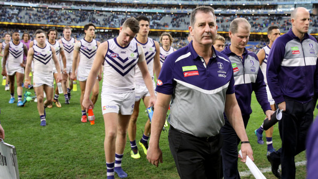 The Fremantle Dockers, led by coach Ross Lyon, after their loss to cross-town rivals West Coast earlier this year.